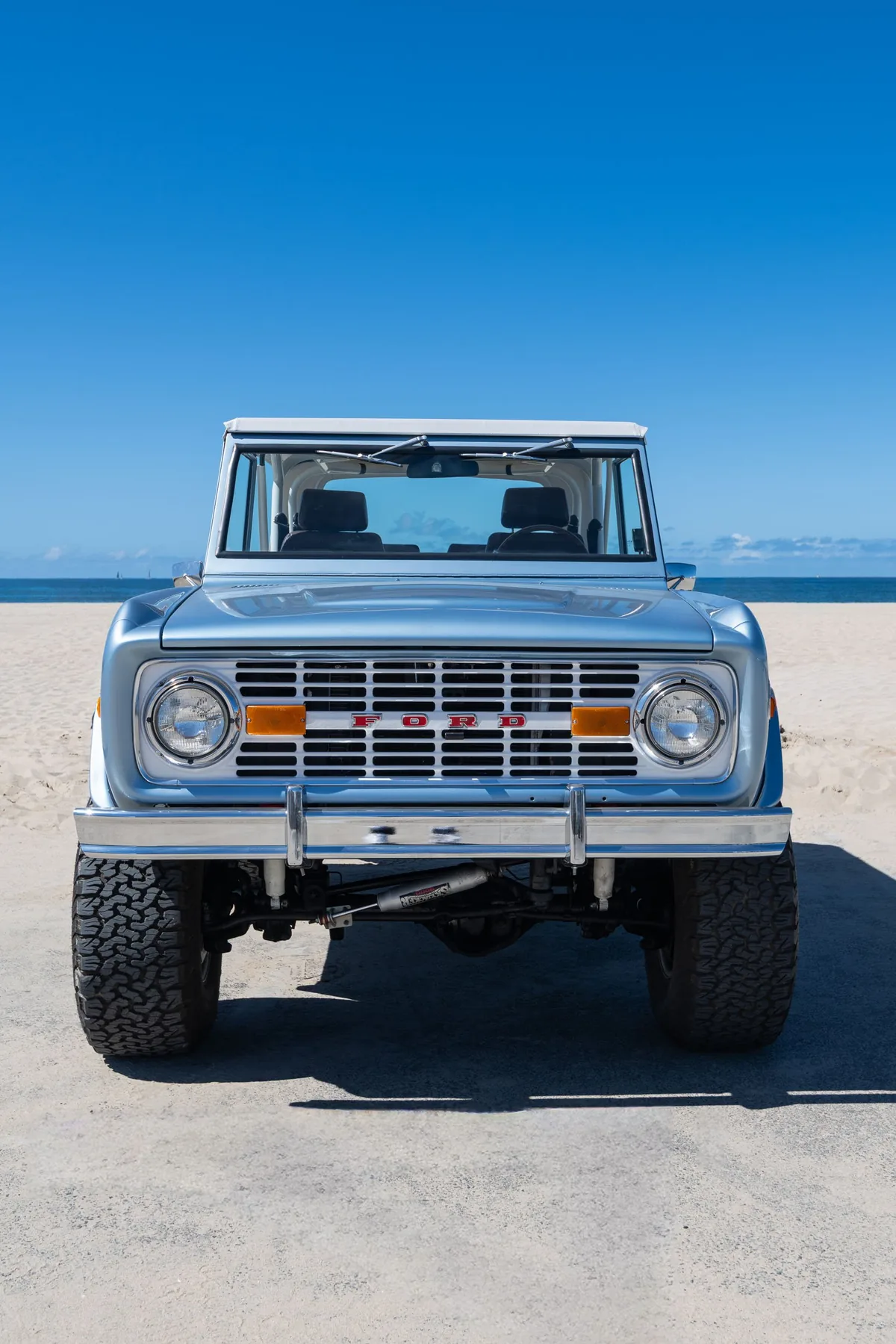 Bella — Brittany Blue 1977 Bronco on the beach
