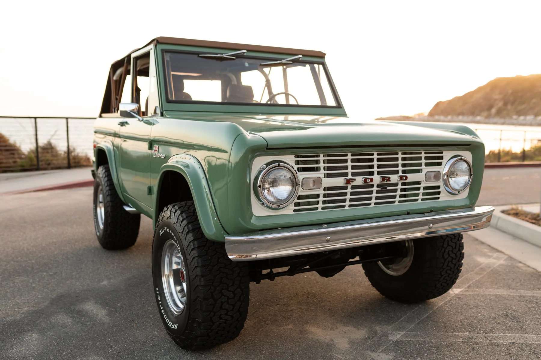 The Grasshopper — boxwood green Bronco by the beach