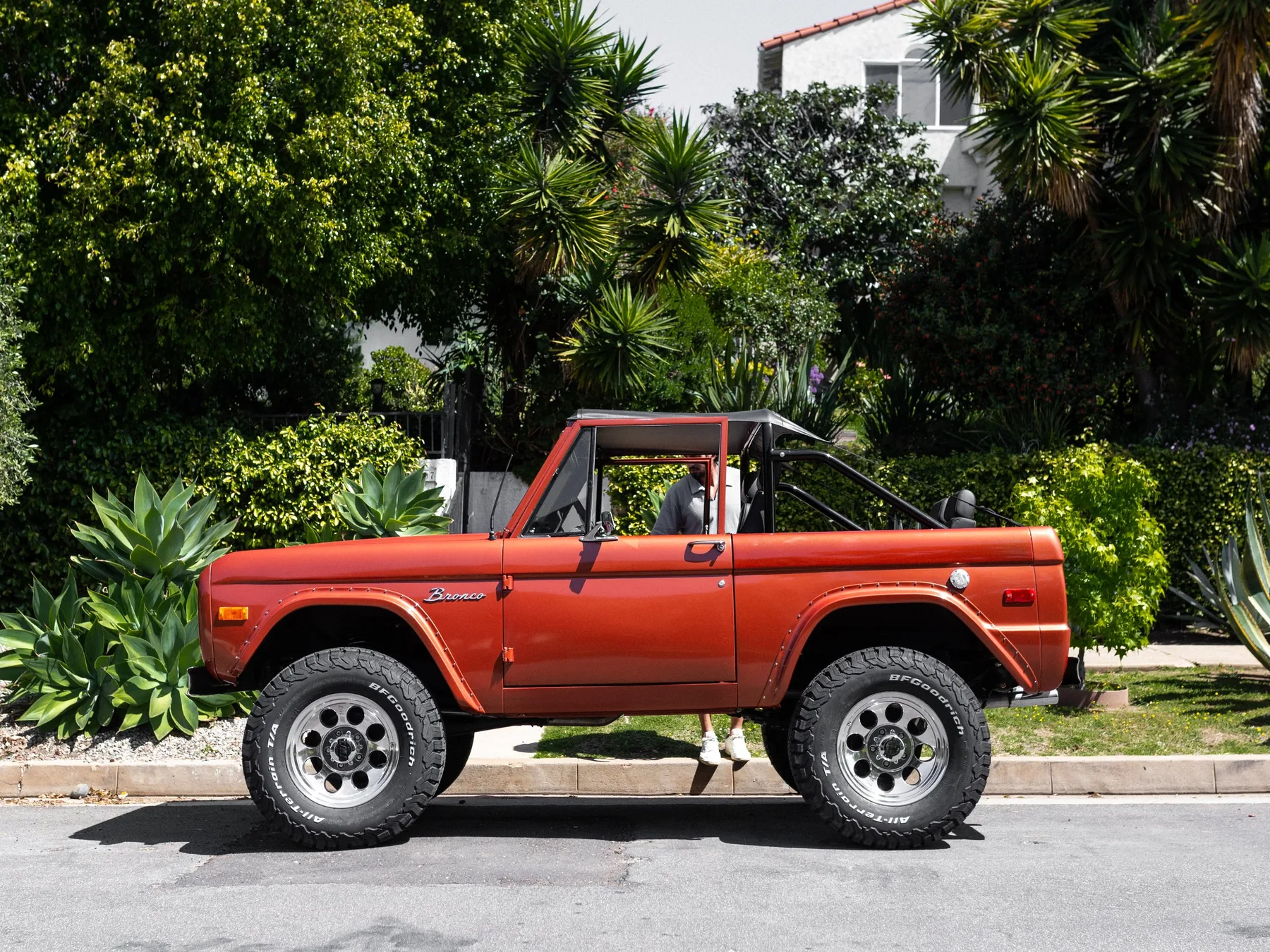 Sargent Pepper — burnt orange Bronco with white top